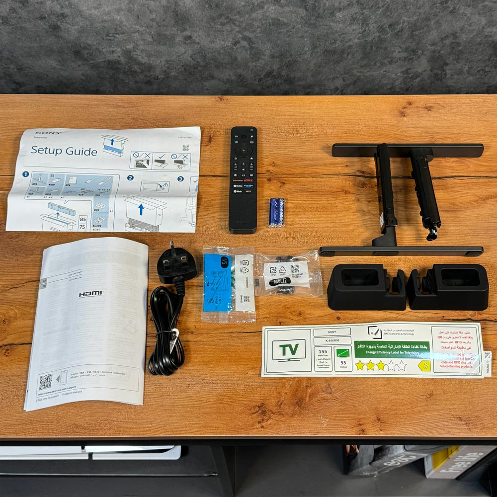 لوازم جانبی تلویزیون سونی BRAVIA 5 شامل ریموت کنترل، پایه، کابل برق و دفترچه راهنما